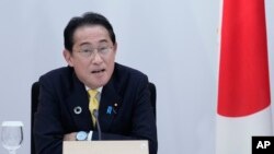 Japanese Prime Minister Fumio Kishida speaks during a G-7 working session on food, health and development during the G-7 Summit in Hiroshima, Japan, May 20, 2023.
