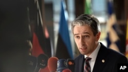 FILE - Ireland's Prime Minister Simon Harris speaks with the media as he arrives for an EU summit in Brussels on Thursday, April 18, 2024.