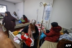 Palestinian children suffering from malnutrition receive treatment at a health care center in Rafah in the southern Gaza Strip on March 5, 2024.