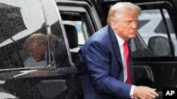 FILE - Former President Donald Trump arrives to board his plane at Ronald Reagan Washington National Airport, Thursday, Aug. 3, 2023, in Arlington, Va., after facing a judge on federal conspiracy charges that allege he conspired to subvert the 2020 election. 