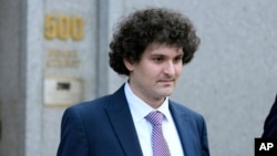 FILE - FTX founder Sam Bankman-Fried leaves federal court in New York on July 26, 2023. The former crypto mogul was sentenced to 25 years in prison on March 28, 2024.