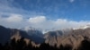 FILE - Snow-capped mountains mark the skyline in Joshimath, in the northern state of Uttarakhand, India, Jan. 15, 2023.