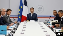 France's President Emmanuel Macron (C) chairs a security and defence council at the Elysee presidential palace in Paris, May 16, 2024, after three nights of clashes in France's riot-struck Pacific territory of New Caledonia protest.