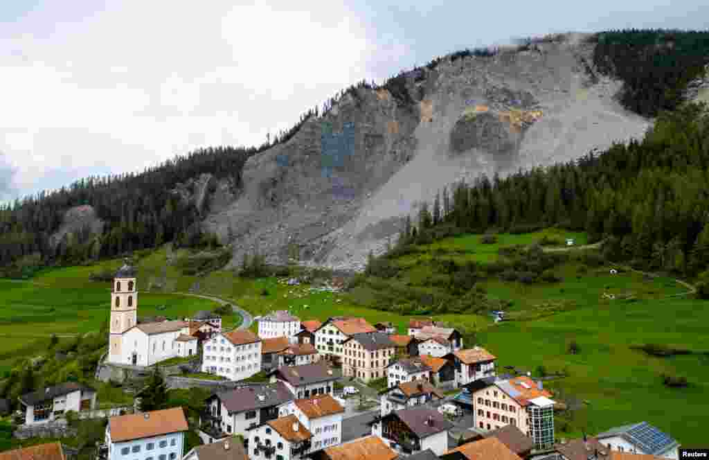 Residents of the village of Brienz are told to evacuate as the mountain of rock above them is expected to come loose and crash down to the valley in the next few days, in Switzerland.