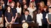 Florida Governor Ron DeSantis signs state house bills into law after giving a press conference at Cambridge Christian School in Tampa, Florida, May 17, 2023.