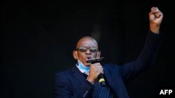 FILE - Ace Magashule, suspended African National Congress (ANC) secretary- general, speaks ahead of former president Jacob Zuma's address following the postponement of his corruption trial in Pietermaritzburg, May 26, 2021. 
