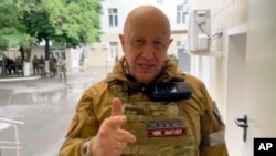 FILE: In this photo released by Prigozhin Press Service, Yevgeny Prigozhin, the owner of the Wagner Group military company, records his video addresses in Rostov-on-Don, Russia, Saturday, June 24, 2023. On Tuesday June 27, his private jet was reported in Mink, Belarus. 
