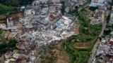 An aerial view shows damaged buildings in the aftermath of a tornado in Guangming Village of Zhongluotan Town, Baiyun District, Guangzhou, south China's Guangdong Province, April 28, 2024.