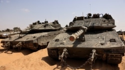 Israeli tanks park near the southern Israel-Gaza border, amid the ongoing conflict between Israel and the Palestinian Islamist group Hamas, in Israel, April 28, 2024. 
