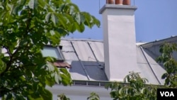 The zinc roofs in Paris could make upper stories unbearably hot in future summers. (Lisa Bryant/VOA)