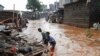 Residents sift through the rubble as they recover their belongings after the Nairobi river burst its banks and destroyed their homes within the Mathare Valley settlement in Nairobi, Kenya, April 25, 2024.