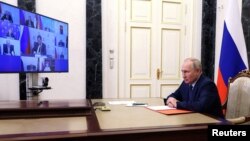 Ruski predsjednik Vladimir Putin predsjedava sastankom sa članovima Vijeća sigurnosti putem video veze u Moskvi, 26. maj 2023.
