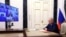 Russian President Vladimir Putin chairs a meeting with members of the Security Council via a video link in Moscow, Russia May 26, 2023.