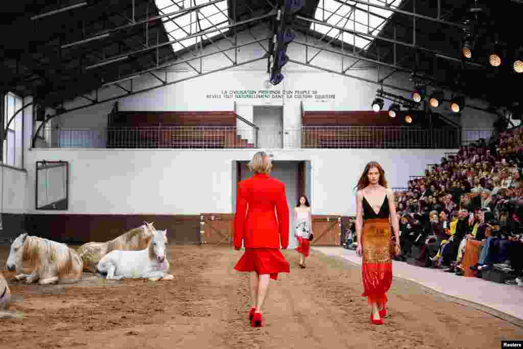 Models present creations by designer Stella McCartney as part of her Fall-Winter 2023/2024 Women&#39;s ready-to-wear collection show during Paris Fashion Week in Paris, France.