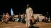 Sudanese, who had been stranded in Jeddah, Saudi Arabia, arrive at Port Sudan airport, Thursday, May 11, 2023.