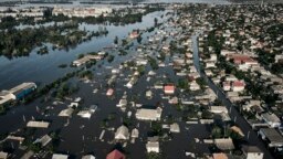 Streets are flooded in Kherson, Ukraine, June 7, 2023 after the walls of the Kakhovka dam collapsed. 
