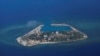 တောင်တရုတ်ပင်လယ်ပြင်ထဲက ဗီယက်နမ်ထိန်းချုပ်ထားတဲ့ Southwest Cay ကျွန်း (သို့) Pugad ကျွန်းကို ဝေဟင်မှမြင်တွေ့ရစဉ် (ဧပြီ ၂၁၊ ၂၀၂၄)