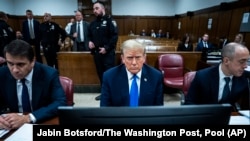 FILE - Former President Donald Trump awaits the start of proceedings during jury selection at Manhattan criminal court in New York, April 18, 2024. 