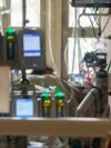 FILE - A pregnant and intubated COVID-19 patient lies in the Surgical Intensive Care Unit in a hospital in Boise, Idaho, on Aug. 31, 2021.