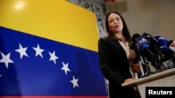 Maria Corina Machado, the winner of Venezuela's opposition presidential primary, addresses the media, in Caracas, Oct. 24, 2023.