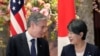 FILE - US Secretary of State Antony Blinken and Japan's Foreign Minister Yoko Kamikawa speak as they wait for group photo session during the G7 Foreign Ministers' Meeting at the Iikura Guest House, Nov. 8, 2023, in Tokyo. 