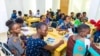 Des jeunes filles en pleine formation sur le numérique, à Cotonou, le 30 juillet 2023.
