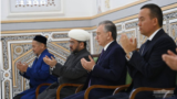 Uzbek leader Shavkat Mirziyoyev praying with country's Grand Mufti Nuriddin Kholiknazarov and other officials at Al-Hakim At-Termizi Mausoleum in Surkhandarya, southern Uzbekistan, March 13, 2023. (president.uz) 