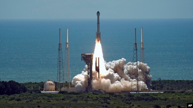 Boeing's Starliner capsule, atop an Atlas V rocket, lifts off from launch pad at Space Launch Complex 41 Wednesday, June 5, 2024, in Cape Canaveral, Fla. NASA astronauts Butch Wilmore and Suni Williams are headed to the International Space Station. (AP Photo/Chris O'Meara)