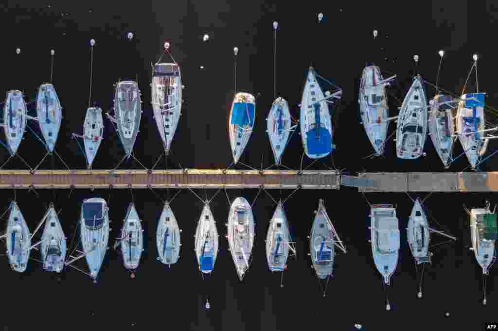 Aerial view showing yachts and sailing ships moored at the Yacht Club Uruguayo in Buceo neighbourhood in Montevideo, Uruguay, March 30, 2024.