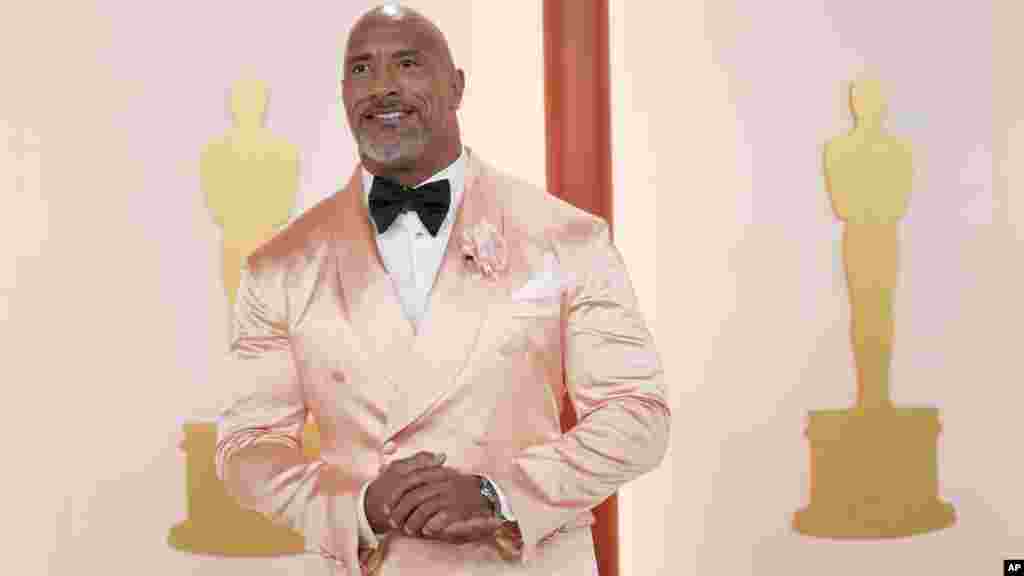 Dwayne Johnson arrives at the Oscars on Sunday, March 12, 2023, at the Dolby Theatre in Los Angeles. (Photo by Ashley Landis/AP Photo)
