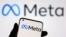 FILE - A smartphone with Meta logo is seen in this illustration taken Oct. 28, 2021. 
