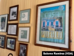 The walls of Casa Pueblo in Adjuntas are adorned by art dedicated to the organization and the Goldman Environmental Prize certificates they won in 2002.(Salome Ramirez/VOA)