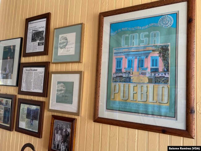 The walls of Casa Pueblo in Adjuntas are adorned by art dedicated to the organization and the Goldman Environmental Prize certificates they won in 2002.(Salome Ramirez/VOA)