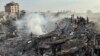 Palestinians look for survivors following Israeli airstrike in Nusseirat refugee camp, Gaza Strip, Oct. 31, 2023. On the same day, U.N. Secretary-General Antonio Guterres said he is "deeply alarmed" by the intensification of the conflict between Israel and Hamas in Gaza.