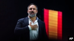 Santiago Abascal, leader of Spain's far-right Vox party gestures as he delivers a speech during a party rally in Madrid, Spain, May 19, 2024.