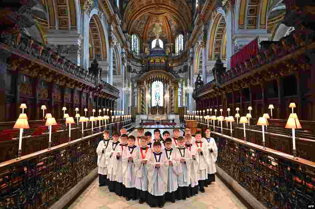 Singers take part in a rehearsal for their upcoming Christmas performances, at St. Paul&#39;s Cathedral in central London.