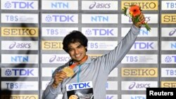 India's Neeraj Chopra celebrates winning gold in the men's javelin throw at the World Athletics Championship, Budapest, Hungary, Aug. 27, 2023.