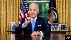 President Joe Biden addresses the nation on the budget deal that lifts the federal debt limit and averts a U.S. government default, from the Oval Office of the White House in Washington, June 2, 2023. 