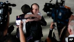 Returned prisoners back in U.S.