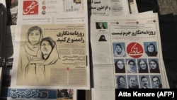 (FILE) Newspapers with images of arrested Iranian journalists in Iran.