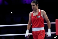 Imane Khelif of Algeria reacts after defeating Italy's Angela Carini in their women's 66-kilogram preliminary boxing match at the 2024 Summer Olympics on Aug. 1, 2024, in Paris, France.