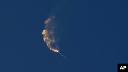 FILE - SpaceX's Starship turns after its launch from Starbase in Boca Chica, Texas, April 20, 2023. The Federal Aviation Administration has closed its accident investigation into SpaceX's failed debut of its Starship mega rocket. 