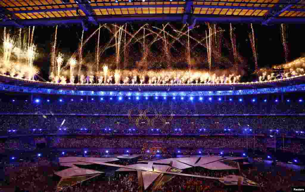 Fireworks explode as Yseult performs during the Paris 2024 Summer Olympics at the Stade de France in Saint-Denis, France, Aug. 12. 2024.