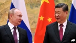 Ruski i kineski predsjednik tokom sastanka u Pekingu, 4. februar 2022.