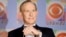 FILE - Tom Smothers does yo-yo tricks during arrivals at CBS's 75th anniversary celebration Nov. 2, 2003, in New York. 