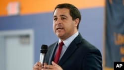 FILE - Wisconsin Attorney General Josh Kaul speaks at a campaign stop on in Milwaukee, Wisconsin, Oct. 27, 2022. Kaul filed felony forgery charges against three individuals for falsely claiming former President Donald Trump had won the state in 2020.