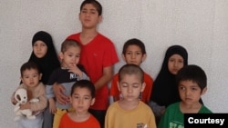 Shirali Abdurehim’s nine children are seen in Istanbul in April 2024. (Photo courtesy of Abdurehim’s wife)