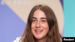 U.S. skateboarder Minna Stess talks to the media during a press conference in Paris, July 25, 2024. (Kirby Lee/USA Today Sports)