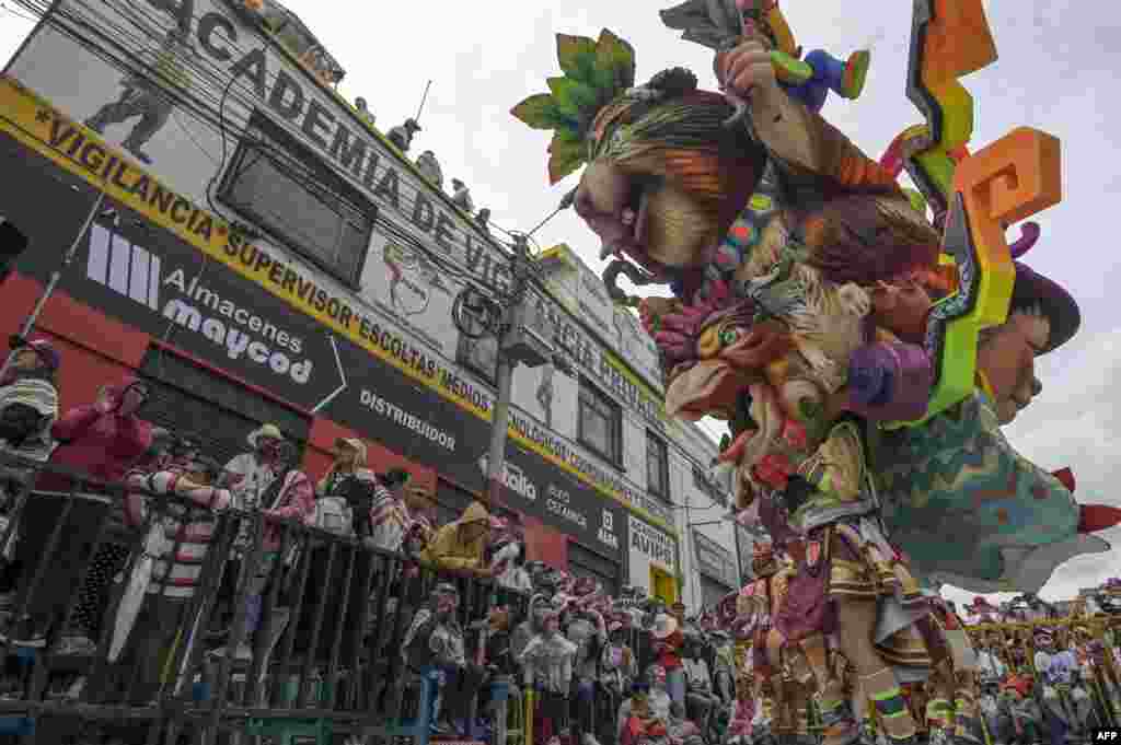 A participant dances during the "White Day" parade during the Carnival of Blacks and Whites in Pasto, Colombia, Jan. 6, 2024. 