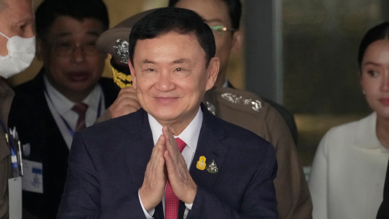 FILE - Thailand's former Prime Minister Thaksin Shinawatra arrives at Don Muang airport in Bangkok, Thailand, Aug. 22, 2023.